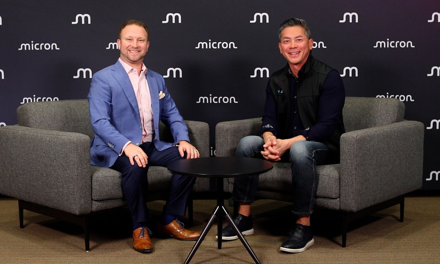  Jeremy Werner on the left and Avery Pham on the right both sitting on the chair 